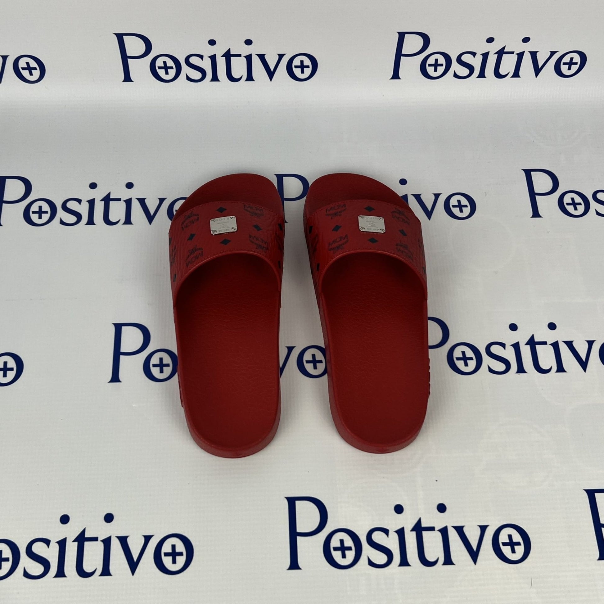 MCM Womens Candy Red Visetos Rubber Slides | Positivo Clothing