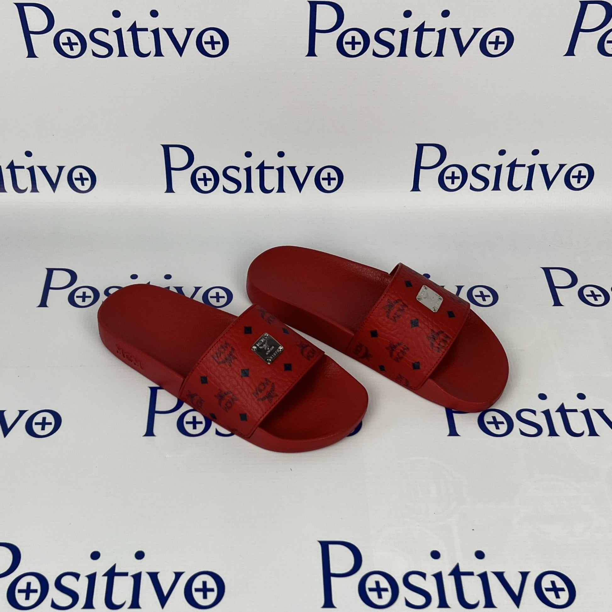 MCM Womens Candy Red Visetos Rubber Slides | Positivo Clothing