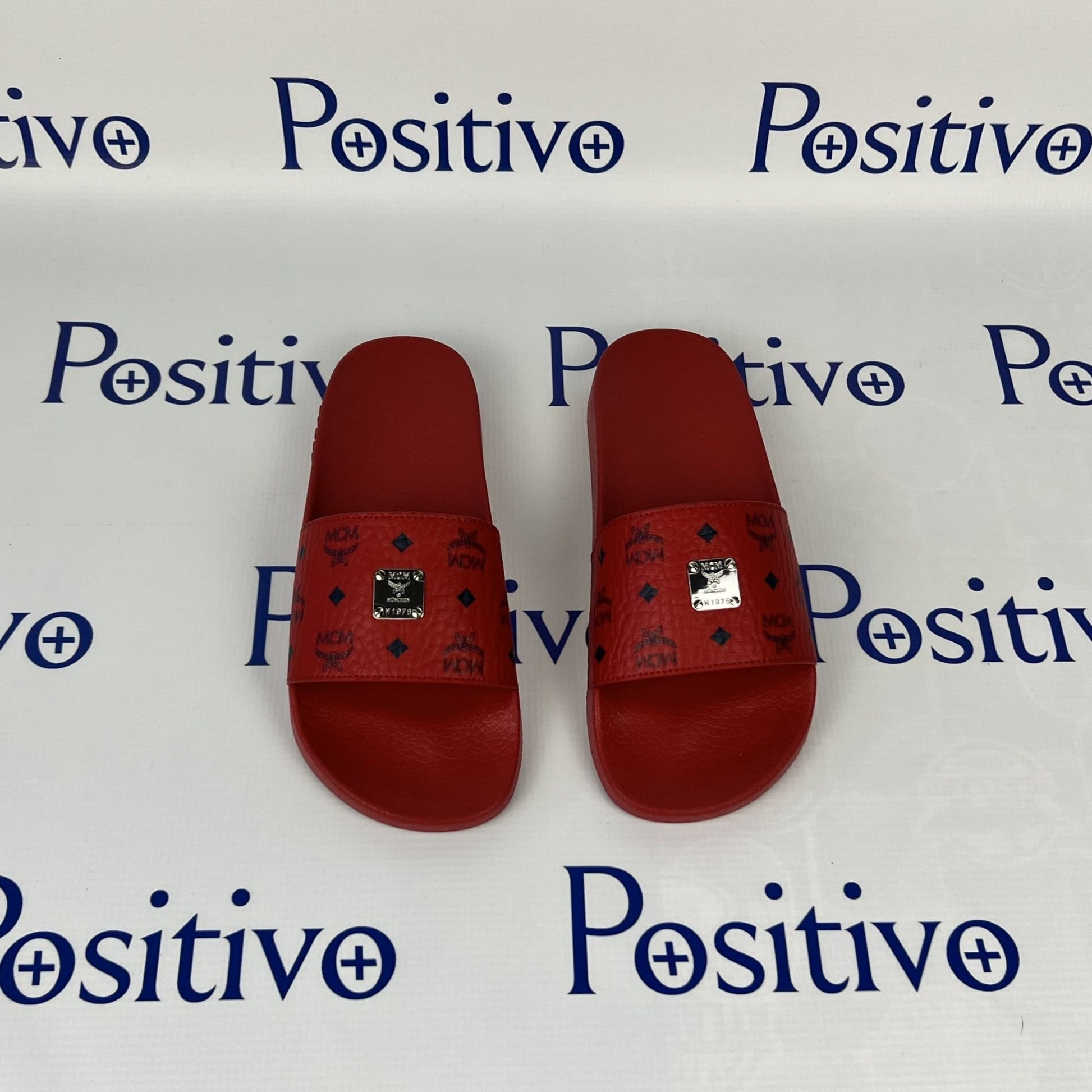 MCM Womens Candy Red Visetos Rubber Slides | Positivo Clothing