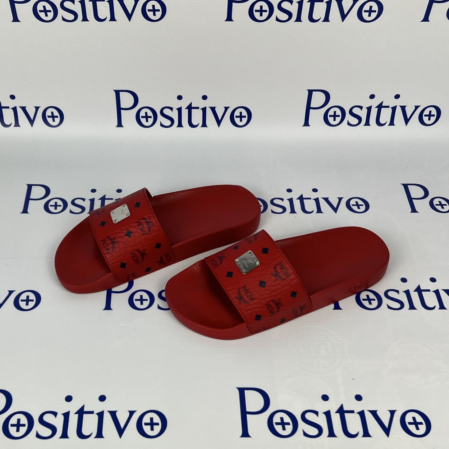 MCM Womens Candy Red Visetos Rubber Slides | Positivo Clothing