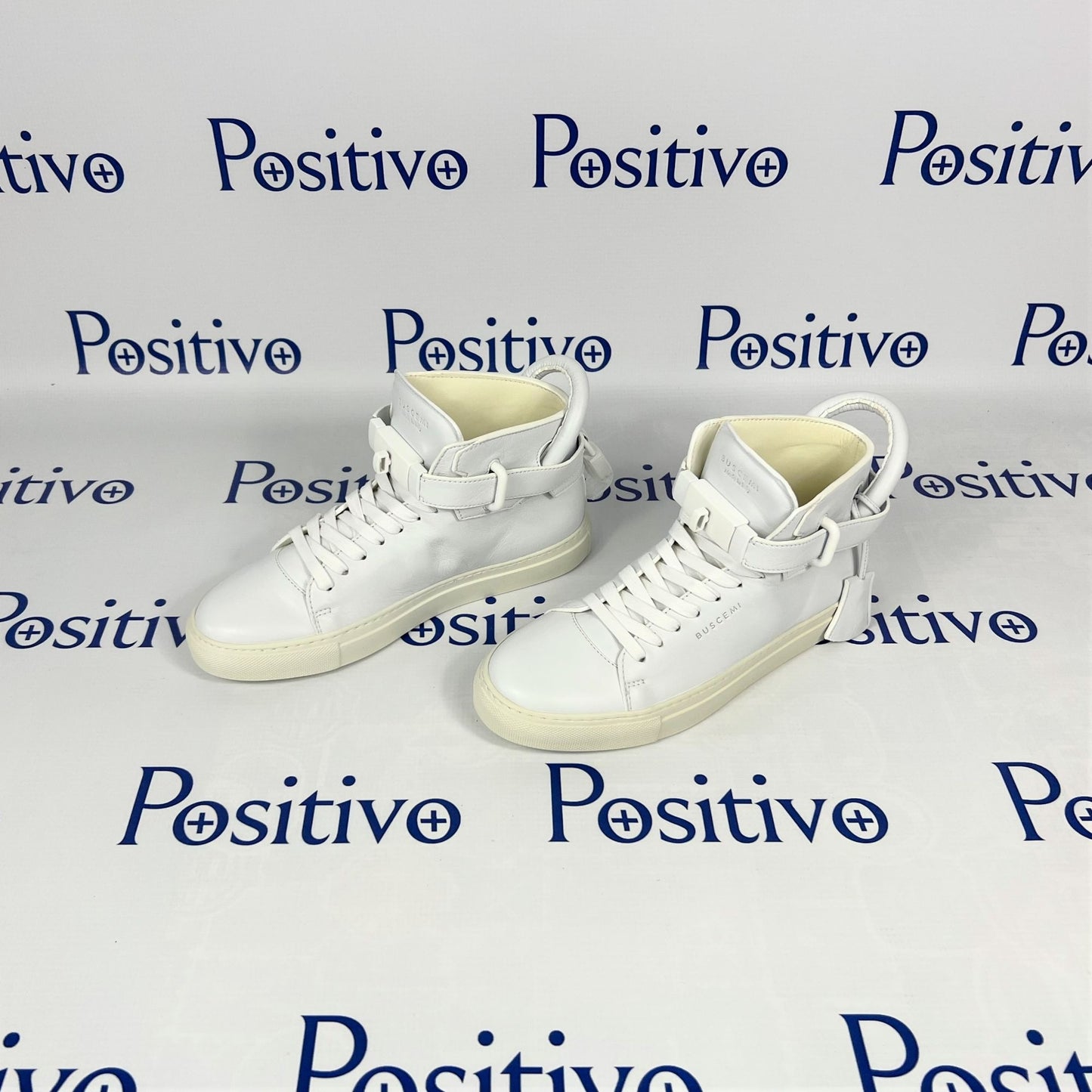 Buscemi Womens 100MM Flat Tonal White Leather Sneakers | Positivo Clothing