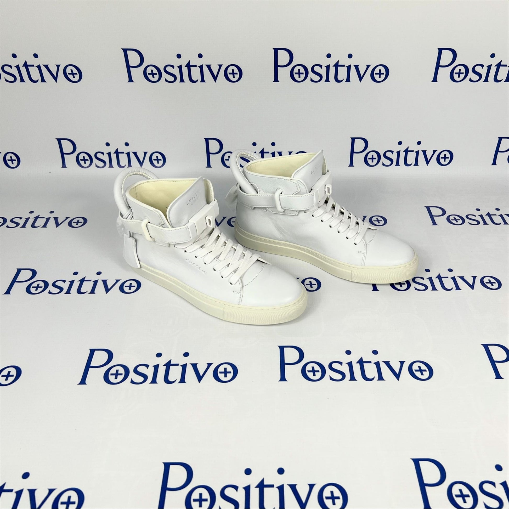 Buscemi Womens 100MM Flat Tonal White Leather Sneakers | Positivo Clothing